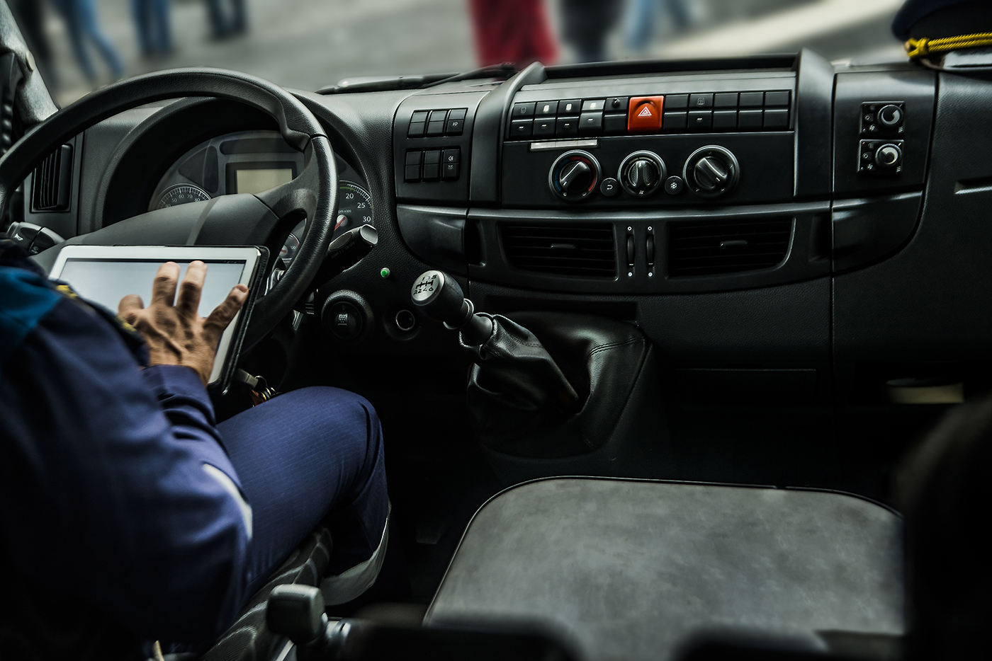 Person using tablet in car