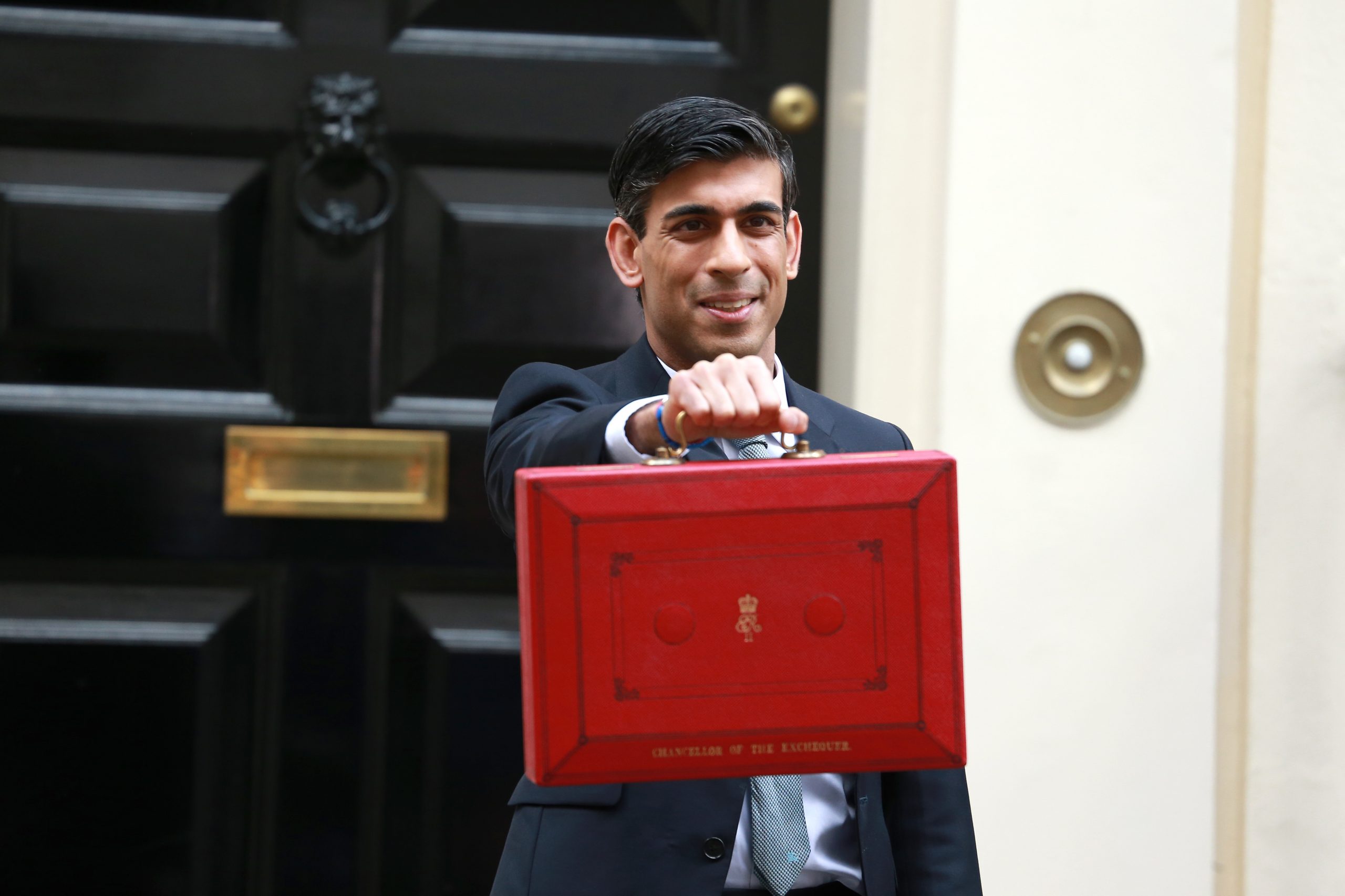 Rishi Sunak holding Budget