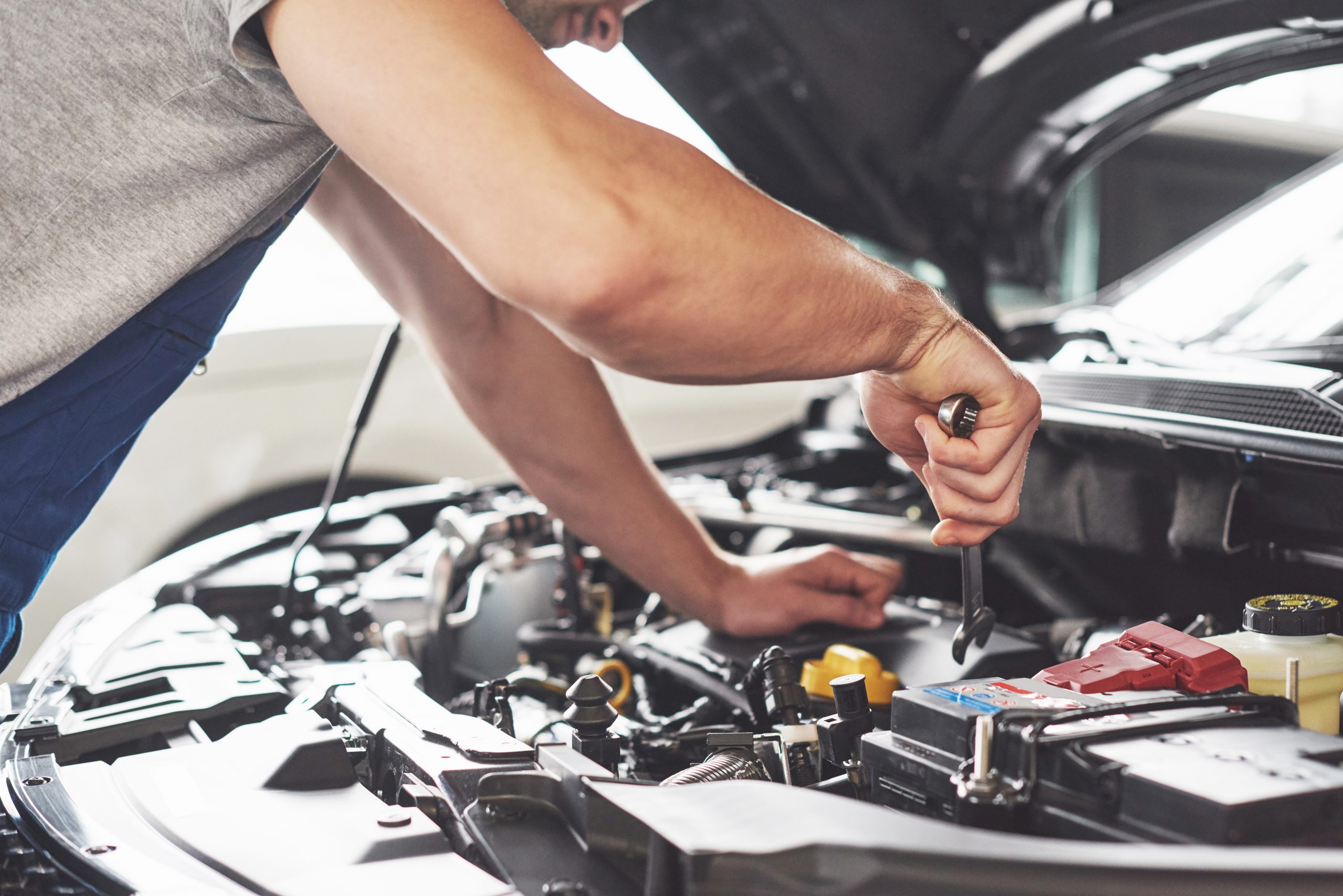 Mechanic working on vehicle