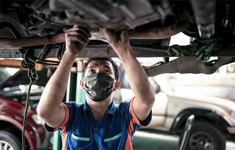 Mechanic wearing mask