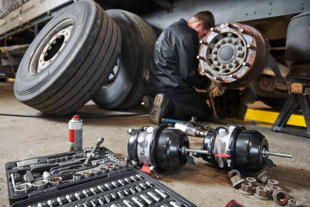Mechanic changing HGV tyres