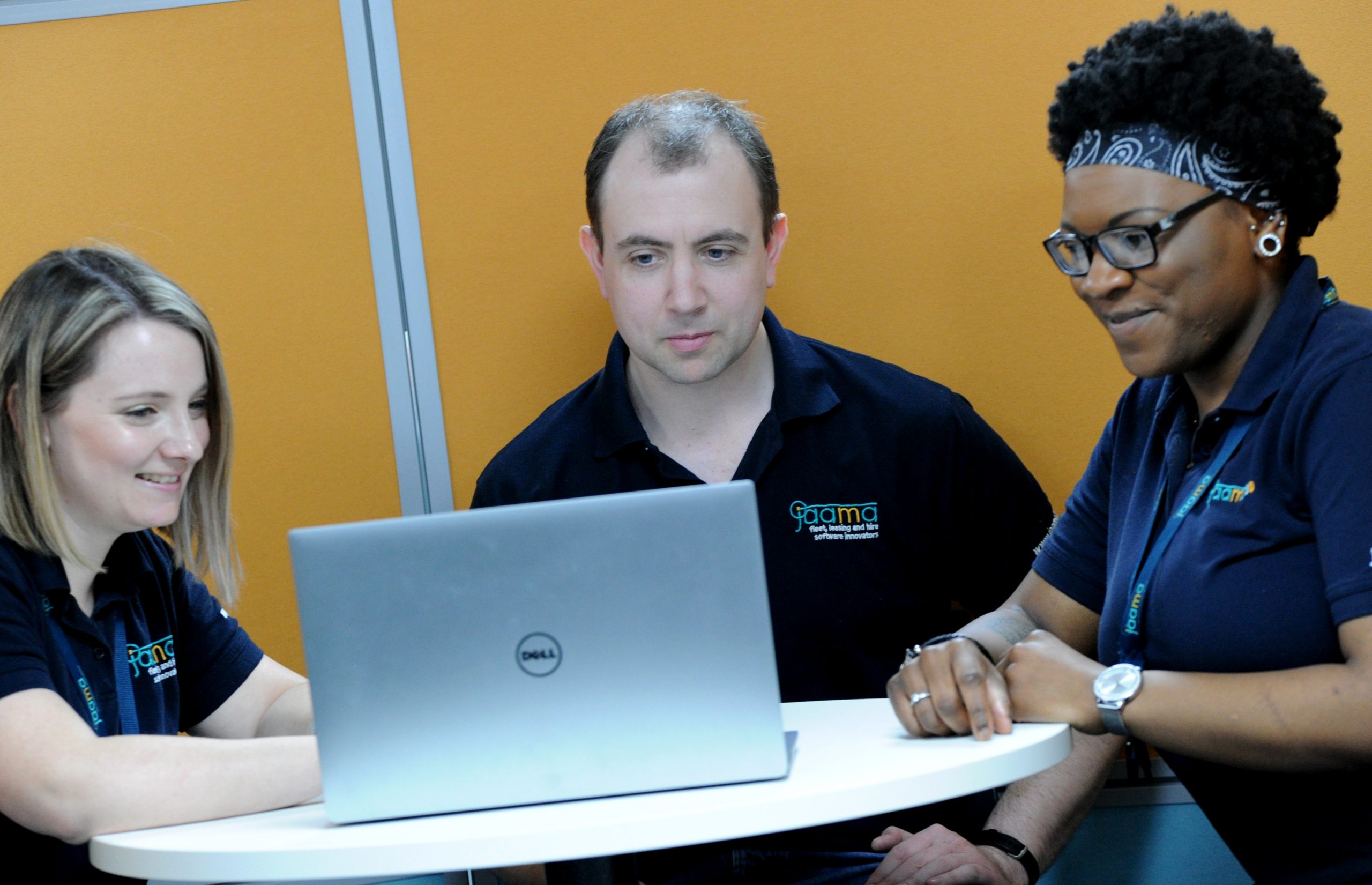 Jaama Staff Working on Laptop