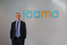 Martin Evans with Jaama Logo