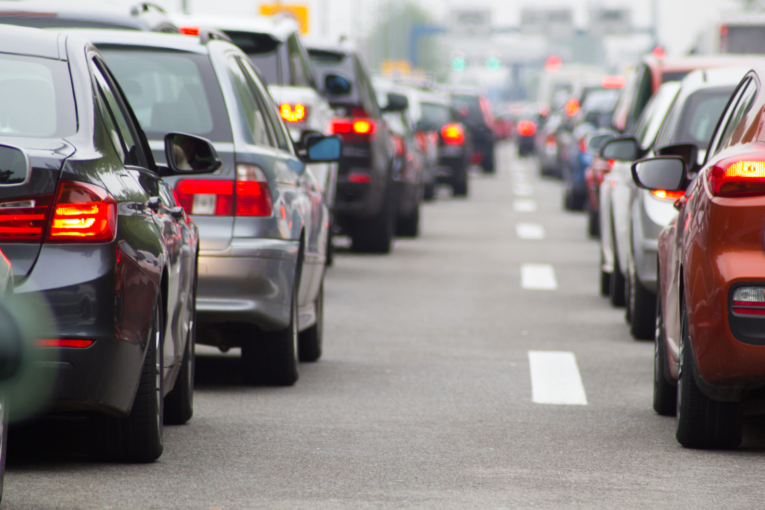 Cars in traffic on road